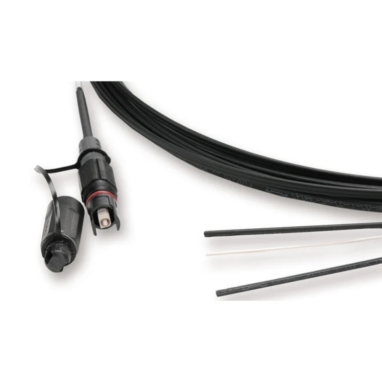 Close-up of OptiTap-style hardened SC/APC connector attached to flat FTTH drop cable
