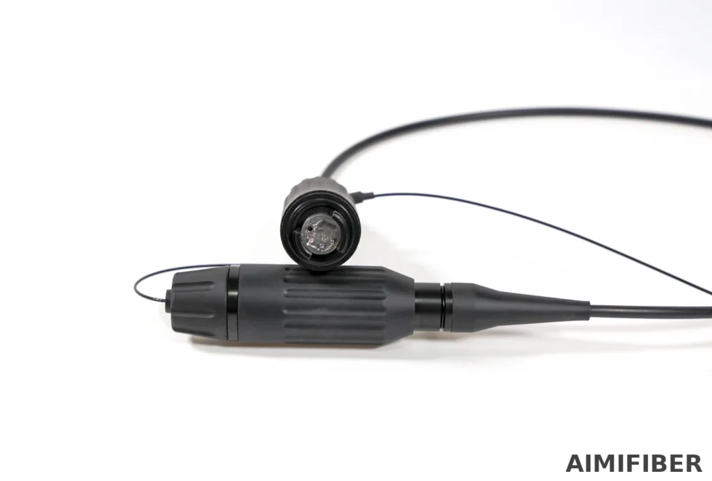 AIMIFIBER 4-core HXB outdoor FTTA fiber connector – HXB 4-core inline plug connector close-up with dust cap