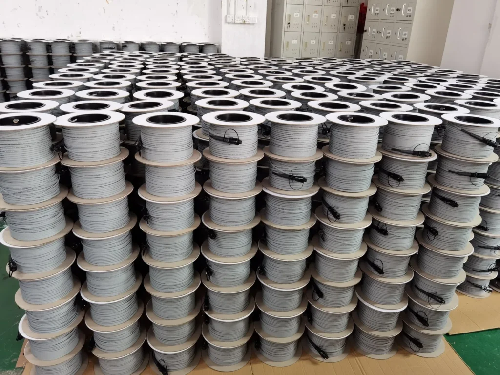 Bulk packed reels of pre-connectorized Figure-8 drop cable for shipment