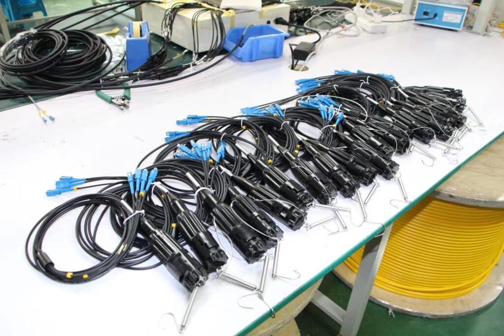 Pre-terminated tactical fiber optic cables ready for field deployment