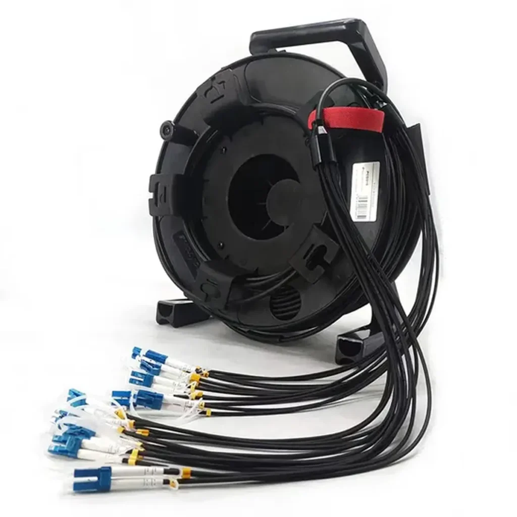 Deployable tactical fiber optic cable reel for field and broadcast use