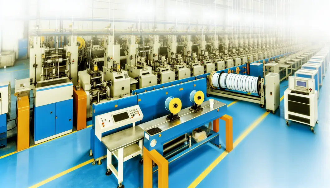 A detailed floor plan of a fiber optic cable manufacturing workshop showing clearly designated areas for various operations.